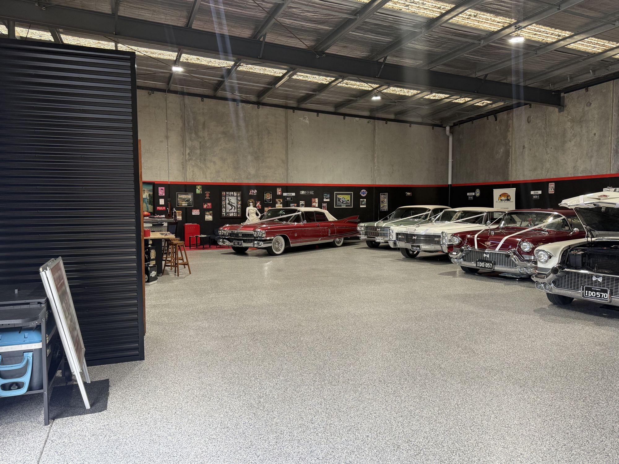 Wide view of the classic Cadillacs inside the Caddyman showroom at 2/3 Duiker Court, Langwarrin