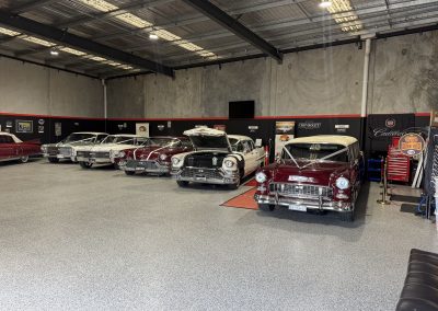 The Caddyman fleet lined up inside the Caddyman showroom at 2/3 Duiker Court, Langwarrin